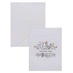 two cards with thank you written on the front and back, one in white paper