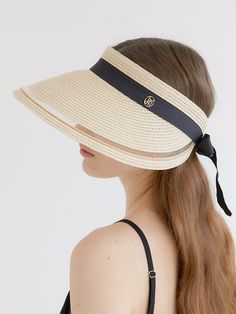 Editor's Notehalden is a brand that started with the minimalism and warm sensibility of Northern Europe.- Wide visor that can cover your face well- Brand logo pendant point- Size adjustable with ribbon around the hat- Daily point item Measurements (in.)- Head Girth: 21.26 in. ~ 23.62 in.- Depth: 1.77 in.- Visor: 4.92 in. Composition & Care- 100% Raffia- Do not wash or dry cleaning- Do not squeeze or iron- Wipe off moisture and stains with a dry cloth with little moistureDesigner- b Elegant Beige Visor Sun Hat, Elegant Adjustable Visor Sun Hat, Elegant Adjustable Straw Hat With Uv Protection, Elegant Adjustable Visor Hat, Chic Adjustable Hats With Uv Protection, Chic Adjustable Hat With Uv Protection, Chic Hats With Uv Protection And Adjustable Fit, Adjustable Visor With Uv Protection, Spring Curved Brim Visor