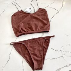 New With Tags! By Intimately Free People . Size Xs / S. Color Is A Rust / Terracotta / Brown With Red Undertones . Stretchy Material. No Trades!! Tags : Boho , Bohemian , Sexy , Bundle , Intimates , Underwear , Cropped Cami Top , Camisole , Undies , Panties , Panty , Wine , Burgundy , Merlot , Elastic Straps , Muted Red , Terracotta, Rust , 2-Piece Set Stretch Bra-friendly Sleepwear For Loungewear, Seamless Bottoms For Summer Lounging, Seamless Bottoms For Lounging In Summer, Seamless Lounging Bottoms For Summer, Cotton Camisole For Relaxation, Seamless Stretch Sets For Loungewear, Stretch Camisole Bottoms With Built-in Bra, Seamless Summer Bottoms For Daywear, Summer Stretch Camisole For Lounging