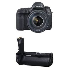 the canon eos - 1 camera is shown with its battery and charger attached