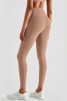 Yes, these Lexi Cacao High-Rise Tight Leggings are everything we love so far. Made of stretchy Lycra fabric, the high-waisted design highlights your figure. Pair these leggings with a crop top and sneakers for the ensemble we've always dreamed of.  Full Length: Approx 73cm Materials: 81% Nylon, 19% Lycra® elastane Stretch Type: Very Stretchy Gentle Dry Clean Only  Model is 5 ft 7 and wears size 6  Colour may vary due to lighting on images. The product images (without model) are closest to th High Waist Sports Leggings, Drawstring Bucket Bag, Lycra Fabric, Legging Sport, High Intensity Workout, Canvas Crossbody Bag, Flounce Sleeve, Sports Leggings, Bandage Dress