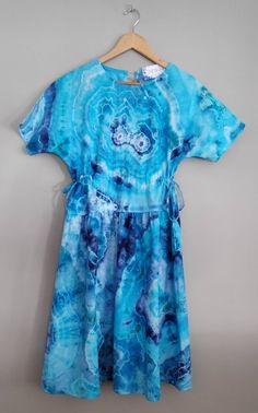 Women's Summer Dress Tie Dye Dress Geode Design Handmade Clothing.  Welcome to my tie-dye store! I lovingly make each item by hand, they are unique and one of a kind. The dyes I use are premium quality fiber reactive dyes and my products are all pre-washed and pre-shrunk for you. I will ship your order within two business days. Thank you for your interest in my store, please follow me on Instagram to see my latest creations. I truly appreciate your business, feedback and reviews! Washing Instruc Flowy Tie-dye Batik Print Dress, Blue Summer Dress With Natural Dye, Blue Batik Print Dress For Spring, Summer Indigo Batik Print Dress, Indigo Batik Print Summer Dress, Blue Vacation Dress With Natural Dye, Blue Vacation Dresses With Natural Dye, Blue Dresses With Natural Dye For Vacation, Casual Flowy Batik Print Dresses