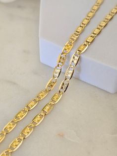 Unique 100% Solid 14k yellow diamond cut gold valentino chain. Perfect to wear everyday and everywhere. Shiny, elegant and everlasting. you will never want to take it off. 14k Gold will not tarnish or rust. Perfect gift for him/her. This chain stands out from the regular desings. - Materials: 14K Solid Yellow Gold - Thickness: 4MM - Lenght and Weight: 8" (Bracelet) - 4.9 grams  16" - 9.9 grams 18" - 11 grams  20" - 12.1 grams 22" -13.3 grams 24" - 14.6 grams (All weights are just an approximate Gold Diamond Cut Chain Link Necklace, 14k Gold Chain Necklace With Diamond Cut, 14k Gold Oval Link Necklace With Diamond Cut, Perfect Gift For Him, Solid Gold Jewelry, Yellow Diamond, Solid Yellow, Diamond Cut, 16 9