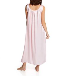 Enjoy the silky smooth comfort of this lustrous satin nightgown as you lounge and sleep. Flattering scoop neckline. Ruching along the neckline at front and back adds fullness. Sleeveless. Non-adjustable shoulder straps have overlapping detail at top. Relaxed styling provides a comfortable fit. Pullover styling. Perfect for warm weather sleep or lounge. Made in the USA. Amanda Rich Women's Satin Banded Sleeve Long Gown in Light Pink | Size XS | HerRoom.com Feminine Sleepwear With Satin Finish, Feminine Satin Nightgown For Bedtime, Sleeveless Modal Satin Sleepwear, Feminine Satin Nightgown For Sleep, Silk Sleepwear With Satin Finish For Wedding Night, Silk Satin Finish Sleepwear For Night, Silk Satin Finish Sleepwear, Feminine Silk Nightgown For Sleep, Feminine Satin Finish Sleepwear For Night