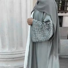 Beads. Satin. Pockets. This Jameelah Satin Beaded Open Abaya is the most beautiful kimono style open abaya for you. Available in 4 beautiful colors. Kimono Hijab, Party Long Dress, Abaya Kimono, Green Kimono, Mode Kimono, Open Abaya, Black Kimono, Mode Abaya, Embroidered Midi Dress