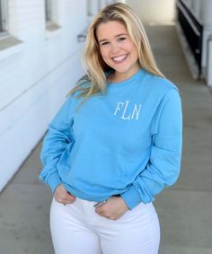 Everyone's closet needs a go to monogrammed tee and this is just the perfect one! This monogrammed shirt is great for layering or as a primary piece! Pair with a monogrammed vest or cardigan for a stylish look. Our personalized tee shirt is completely customizable to fit your personal style. Choose from a variety of font and thread choices and also pick where you want your monogram. You can choose from a pocket area monogram to a lower corner monogram! 
At Born To Be Sassy we love helping you to Preppy Crew Neck Tops For Fall, Trendy Cotton Tops With Monogram Print, Cotton Monogram Print Top For Fall, Casual Monogram Print T-shirt For Spring, Casual Monogram Print Tops For Spring, Casual Monogram Sweatshirt For Fall, Casual Personalized T-shirt For Fall, Casual Tops With Monogram Print For Spring, Personalized Casual T-shirt For Fall