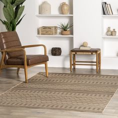 a chair and table in a room with white walls