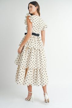 The cutest Kate Middleton inspired,Polka dot print scalloped ruffle sleeve and ruffle tiered midi dress with black sash self tie detail. Lining.Perfect for a wedding or special event model is wearing a size small. Dress Polkadot, Polka Dot Midi Dress, Levis Outfit, Dot Print Dress, Skirt Jumpsuit, Tiered Midi Dress, Lifestyle Trends, Ruffle Sleeves, Cream Dress