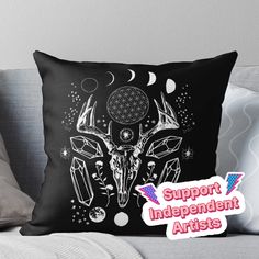 a black and white throw pillow with the words support independent artists on it's front