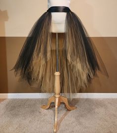 "I CAN MAKE THIS TUTU IN ANY COLOR AND SIZE, PLEASE NOTE THE EXACT TULLE AND RIBBON COLOR AT CHECK OUT (Without note I will make it same color with 1st list photo in black over gold front open hi lo tutu). 1ST PHOTO TUTU LENGTH FRONT 20'' KNEE LENGTH, BACK 44'' FLOOR LENGTH, FOR HEIGHT AROUND 5'3'' wear a couple inches of heels . This tutu is made with 200-400 yards of 6'' wide fine tulle so it's super full. Stretchy waist along with a big ribbon bow ties on the waist. (I might use 2''or 1.5'' r Stretch Tulle Petticoat For Halloween, Halloween Stretch Tulle Petticoat, Fitted Black Tutu Dress With Tulle Skirt, Black Stretch Tulle Petticoat, Halloween Tulle Petticoat, Gold Tulle Skirt, Big Ribbon Bow, Open Skirt, Gold Tulle