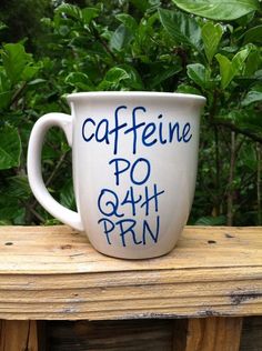 a coffee cup with the words caffeine po q4h prn written on it