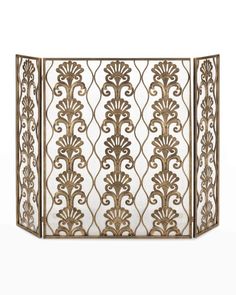 an ornate screen with gold foilwork on white fabric, in the style of art deco