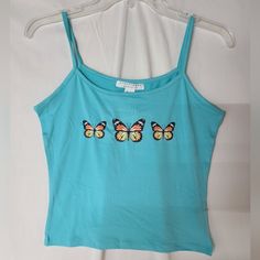 Nwt Streetwear Society Small Blue W/Butterflies Spaghetti Strap Tank Top. 92% Polyester, 8% Spandex Blue Y2k Tank Top For Spring, Y2k Blue Tank Top For Spring, Y2k Style Blue Tank Top For Spring, Casual Sleeveless Tops With Butterfly Print, Sleeveless Summer Tops With Butterfly Print, Light Blue Casual Cotton Camisole, Light Blue Cotton Casual Camisole, Summer Fitted Tops With Butterfly Embroidery, Trendy Summer Tops With Butterfly Embroidery