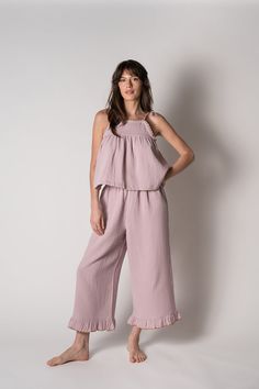 Not just for sleeping, this 100% organic gauze cotton lounge set is soft, lightweight and breathable. Perfect to wear on a summer day or evening! Wear to the beach or just relaxing at home. Made with adjustable shoulder ties and a drawstring waist for added comfort. Finished with contrast scalloped edges and a  yoke se Chic Summer Sleepwear With Relaxed Fit, Chic Relaxed Fit Summer Sleepwear, Chic Cotton Sleepwear With Relaxed Fit, Feminine Summer Sleepwear For Relaxation, Chic Summer Cotton Sleepwear, Summer Vacation Sleepwear With Ruffles, Summer Vacation Ruffled Sleepwear, Summer Sleepwear With Elastic Waistband For Relaxation, Chic Summer Sleepwear For Loungewear