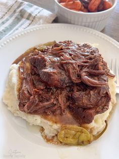 The slow cooker makes this fall-apart, easy Mississippi Roast smothered in rich gravy melt in your mouth. And the best part? This dump and go recipe requires almost no prep time!