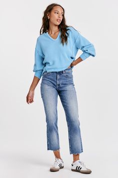 The 90s Jean in Mozzie presents a timeless style with a modern twist. Crafted from stretch denim with a high rise fit that sits slightly lower on the waist and fitted in the hips, these ankle skinnies promise a chic, sleek fit. 9 1/2" Front Rise (include waistband), 10" Leg Opening, 28" inseam (Size 27) 90% COTTON 8% POLYESTER 2% SPANDEX Machine wash cold, Tumble dry low Imported Zip fly and button closure Five-pocket style Trendy Jeans For Spring Casual Gatherings, Trendy Spring Jeans For Casual Gatherings, Trendy Fall Jeans For Casual Gatherings, Mid-rise Denim Bottoms For Casual Gatherings, Spring Casual Jeans With Five Pockets, Fall Mid-rise Jeans With Frayed Hem, Spring Jeans For Casual Gatherings With Five Pockets, Fall Cropped Jeans With Frayed Hem And Relaxed Fit, Trendy Everyday Cropped Jeans