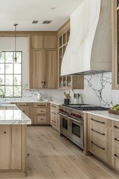 a large kitchen with wooden cabinets and marble counter tops on the island in front of an oven