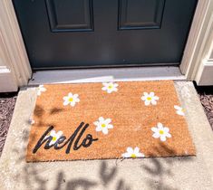 a door mat with the word hello written on it