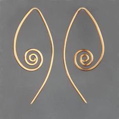 This unique spiral hoop earrings are handmade using Copper. The Length of the earrings is 1 3/4inches 45mm. ;-) My contact number: 626-379-1904. Please contact me if you would like to order multiples or customize a design for your special event, I will be pleased to give you a discount on a quantity order. ;-) Purchases will be shipped within 1-3 business days. In case of occasional shortage of beads material, purchases will be shipped in a week. Packages are shipped via USPS first-class mail wi Elegant Spiral Wire Wrapped Hoop Earrings, Elegant Spiral Hoop Earrings For Gift, Elegant Spiral Hoop Earrings As Gift, Unique Spiral Hoop Earrings, Unique Spiral Wrap Earrings For Gift, Unique Spiral Wrap Earrings As Gift, Unique Swirl Jewelry As A Gift, Handmade Gold Swirl Jewelry, Handmade Swirl Shaped Gold Jewelry