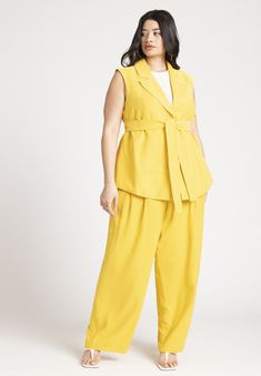 90% Polyester / 10% ModalMid-Stretch WovenEasy fitFully linedSingle breasted snap closure, Notch lapelSleeveless, Removable waist tie Hits below the Yellow Kiwi, Waist Vest, Pleated Wide Leg Pants, Vest And Tie, Swimsuits For All, Box Pleats, Wide Leg Trousers, Waist Tie, Snap Closure