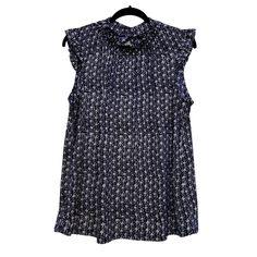 Nwt Adrianna Papell Ruffle Mock Neck Tank Sleeveless Career Top In Navy And White Fancy Flower Back Button Closure Stretchy Knit Fabric Size Large Measurements Bust 42”, Length 26” Smoke Free / Pet Free Home Blue Sleeveless Ruffled Tops, Sleeveless Floral Print Blouse For Work, Blue Ruffled Sleeveless Blouse, Blue Sleeveless Blouse For Daywear, Heart Print Blouse, Crochet Long Sleeve Tops, Black Lace Shirt, Lace Sleeve Blouse, Black Knit Top