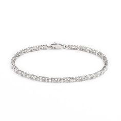 Bracelet Details: Length: 7.5-in. Clasp:box Metal: rhodium over silver-plated bronze Cubic Zirconia Details: Cut: round Color: white Setting: prong Size: One Size. Gender: female. Age Group: adult. Material: Silver Plate. Elegant Cubic Zirconia Crystal Bracelet With Diamond Cut, Elegant Cubic Zirconia Bracelet With Diamond Cut, Elegant Diamond Cut Cubic Zirconia Crystal Bracelet, Classic Crystal Bracelet With Sparkling Stones, Diamond Cut Crystal Bracelet In Diamond White, Diamond White Crystal Bracelet With Diamond Cut, Diamond Cut Cubic Zirconia Crystal Bracelet, Classic Cubic Zirconia Bracelets With Sparkling Stones, Classic Bracelets With Sparkling Stones In Diamond White