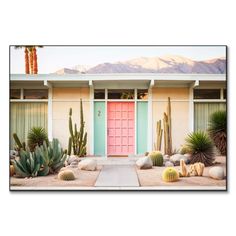 an adobe style house with cactus and cacti in front of the door is shown