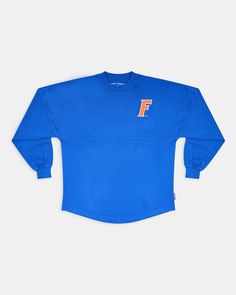 a blue long sleeved shirt with the letter f on it