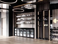 an empty gym with rows of exercise equipment on the wall and shelves full of bottles