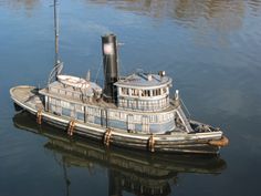 a boat floating on top of a body of water