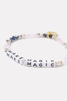 A wearable reminder of words to live by, this beaded bracelet by Little Words Project is handcrafted with "Make Magic" lettering and pink and blue beads. Alone or stacked, it makes the perfect gift for yourself or a friend. Little Words Project encourages you to wear your word to lift you up, and then pass it on to someone who needs it more. Each bracelet comes with a unique ID tag. Use this code to register your bracelet on the Little Words Project website to join the community and track your b Personalized Pink Beaded Bracelet With Meaningful Style, Personalized Pink Beaded Bracelets, Personalized Meaningful Pink Bracelet, Inspirational Pink Round Beads Jewelry, Everyday Inspirational Pink Bracelets, Inspirational Adjustable Pink Name Bracelet, Inspirational Pink Beaded Jewelry, Adjustable Crystal Bracelet With Letter Beads For Everyday, Adjustable Pink Jewelry With Letter Print