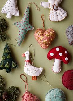 christmas ornaments are arranged on a table