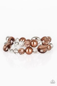 An array of brown pearls, shiny silver beads, and brown crystal-like beads are threaded along stretchy bands around the wrist for a refined look.

 Sold as one set of two bracelets. Bedazzled Jewelry, Brown Pearls, Brown Bracelet, Paparazzi Accessories, Exclusive Jewelry, Stretchy Bracelets, Paparazzi Jewelry, Beaded Stretch Bracelet, Shiny Silver