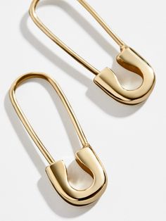 Our best-selling Spillo Earring gets an adorable revamp in our downsized, miniature style. This pair of threader earrings mimics the silhouette of a safety pin, adding something unexpected yet surprisingly elegant to your ears. Even better, each pair is crafted with 18K gold plated sterling silver, meaning you'll be able to wear these for a lifetime. Extra Petite, Safety Pin Earrings, Mini Earrings, 18k Gold Earrings, Gold Dangle Earrings, Threader Earrings, Storage Pouch, Gold Earrings Dangle, Safety Pin