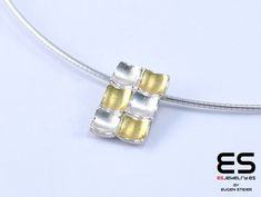 This pendant is made of sterling silver and  24k gold . The 24 k gold is fused together with the silver using heat only. Ths is an ancient Corean technique named Keum Boo and means  ̈attached gold ̈.  A sterling silver  ̈omega ̈chain is included .  Reference code: MOZ3001X Size: 10 x 15 mm All ES Jewelry products have a 2 years guarantee from date of purchase and are shipped in our beautiful, branded  packaging. Keum Boo, Titanium Jewelry, Branded Packaging, Pendant Silver, Star Pendant, Custom Rings, Sterling Silber, Silver 925, Necklace Etsy