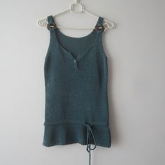 "Vintage Knitted Top Sleeveless Sea blue - green Top Small Size Top Romantic Summer Top Knitted Spaghetti Straps Comfortable Top  Estimated size: M Measurements (lying flat): Bust: 15.5\"/ 39.3 cm Width: 14\"/ 35.5 cm Length: 25.5\"/ 65 cm Please check measurements to insure a proper fit. Remember to allow yourself some extra room for movement. You can compare these with something from your closet that fits you well. This sweater will come to you freshly laundered and ready to wear. Please feel free contact me if you need additional measurements or have any questions Condition: great Vintage Condition SHIPPING * I ship worldwide via Priority mail (Latvijas Pasts) from Latvia (EU). * I ship from Europe, so please allow 2 to 4 weeks for the package to arrive if you live overseas. * Europe 5 Blue Knitted Sleeveless Top, Sleeveless Fitted Knitted Top, Blue Knitted Sleeveless Vest, Blue Sleeveless Knitted Top, Stretch Sleeveless Knit Crochet Top, Stretch Sleeveless Crochet Top With Knit Fabrication, Green Fitted Crochet Knit Top, Green Fitted Knit Crochet Top, Green Knit Tank Top For Summer