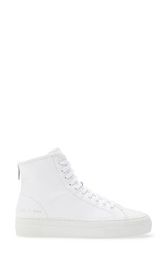 A streamlined high-top sneaker that doesn't shout, this leather kick is foil-stamped with factory ID and style codes for a look that's both sporty and smart. Style Name:Common Projects Tournament High Super Sneaker (Women). Style Number: 5636336. Luxury High-top Sneakers With Embossed Logo, High-top Sneakers With Embossed Logo, High-top Sneakers With Embossed Logo For Streetwear, Modern White High-top Sneakers With Embossed Logo, White High-top Platform Sneakers With Embossed Logo, White High-top Sneakers With Embossed Logo, Medium Fit High-top Sneakers For Streetwear, Streetwear High-top Sneakers, Luxury High-top Sneakers With Perforated Toe Box