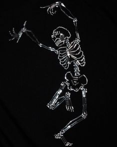 a skeleton is dancing in the dark