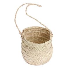 a small basket with rope hanging from it's side on a white background,