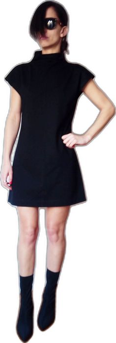 Modern Black Fitted Mini Dress, Modern Black Mini Dress For Workwear, Modern Black Short Sleeve Dress, Modern Black Cocktail Dress, Black Fitted Minimalist Dress, High Neck Black Mini Dress, Fitted Minimalist Black Dress, Black Minimalist Spring Dress, Minimalist Black Summer Dress