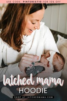 a woman holding a baby in her lap with the caption attached mama hoodie