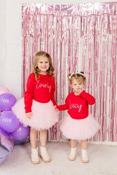 Our Custom Name Sweatshirt is a perfect custom gift for someone special! Add one of our popular tutus to complete the outfit!  This full tutu has ten layers with a wide elastic band inside to keep the itchy tulle off your little ones' skin. The multiple soft layers give a fluffy look but lay perfectly.  OPTIONS AVAILABLE FOR PURCHASE:  Red Sweatshirt with Pink print or White Sweatshirt with Black Print (Custom print colors are available. Please message before purchase to confirm color option) Tu Custom Text Long Sleeve Tops For Gifts, Family Matching Red Tops For Birthday, Custom Name Crew Neck T-shirt For Birthday, Customizable Red Tops For Birthday, Custom Name T-shirt For Birthday With Crew Neck, Long Sleeve T-shirt With Name Print Gift, Customizable Red Long Sleeve Sweatshirt, Personalized Red Tops For Birthday, Birthday Long Sleeve T-shirt With Name Print