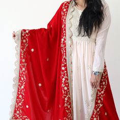 "Indian Ethnic Zardosi Hand Embroidery Red Velvet Classic Wedding Shawl, Beautiful Designed Dupatta Complement your outfit with this Royal Velvet Shawl. This is a very easy to style shawl and it can be paired with any top, blouse, dress, or any other thing, no doubt you'll stand out from the crowd. Dimension : 40\" X 90\" (100cm X 225 cm) approx. Care Instructions:  Dry Clean." Shawl Designs Indian, Transitional Red Kurta With Dori Work, White Dress With Red Dupatta, Red Bollywood Kurta With Dori Work, Red Chinon Salwar Kameez For Transitional Season, Red Anarkali Set With Intricate Embroidery, Red Anarkali Traditional Wear With Dupatta, Red Dola Silk Kurta With Dori Work, Red Salwar Kameez With Resham Embroidery