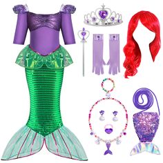 the little mermaid costume is set up with accessories