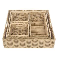 three wicker baskets with lids on each side and two separate trays in the middle