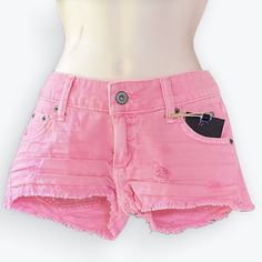 Bringing All The Barbie & Short Shorts Vibes! Made In Los Angeles, These New With Tags Distressed Shorts Are Perfect For Hot Weather. Fabulous Hot Pink Color! Frayed On Legs. 100% Cotton & Made In Usa. The First Picture On Model Against White Background Was Taken In Natural Light; It & The Next 3 Probably Show The Best Representations Of Color. The Last Two On The Table Depict A Distorted Color. Approximate Measurements: Waist (Flat) ~ 13.5” Zipper ~ 2.5" Length From One Upper Inner Leg To Other Pink Short Length Jeans For Spring, Pink Jeans With Frayed Hem For Summer, Pink Short Jeans For Spring, Trendy Ripped Pink Bottoms, Trendy Jean Shorts With Pockets, Spring Pink Short Jeans, Casual Ripped Pink Bottoms, Pink Short Summer Jeans, Casual Pink Short Jeans