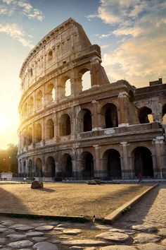 the roman colossion at sunset in rome, italy