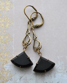 VINTAGE ELEMENTS Unique Jewellery, Handmade from Vintage Inspired Original Designs Long Elegant Art Deco Earrings Vintage, Art Deco, Jet Black, faceted glass fan pendants hang from  antiqued brass filigree connectors. These earrings have antiqued brass leverback earwires and measure 5.2cm from the top of the earwires. Vintage Nickel-free Earrings For Evening, Nickel-free Vintage Earrings For Evening, Antique Brass Earrings For Party, Antique Nickel-free Earrings For Party, Victorian Brass Earrings For Party, Antique Metal Earrings For Party, Victorian Style Nickel Free Earrings For Party, Retro Brass Earrings For Formal Occasions, Antique Metal Earrings For Evening