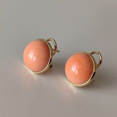 Unique and wonderful earrings in 750 gold (18 kt.) with excellent Pacific coral. Coral is pleurocorallium elatus, now it is rare; of the highest quality and of a rare pink-peach colour. The diameter is 16.3 mm. the thickness is 7.58 - 7.65. The closure is the safest that exists. Total weight is 7.90 g. It will be shipped with a regular purchase invoice. Beautiful Gold Earrings, Purchase Invoice, Peach Colour, Natural Coral, Pink Peach, Gold Earrings, Coral, Stud Earrings, Italy