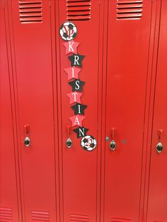 the red lockers are decorated with black and white letters that read, krisin